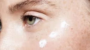 Using Eye Cream on Face